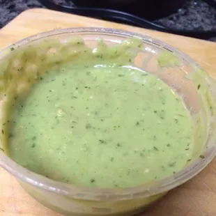 Green sauce. Perfect balance of tomatillo, jalapeño and creamy goodness.  They should sell by the gallon.