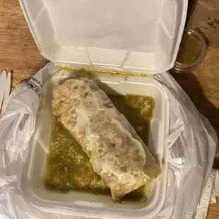 Look at that melted goodness! Pro Tip: when you get a wet burrito, leave the container in the bag. Sauce gets everywhere.