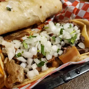 Left: Tripas taco ($2.99). Right: asada taco ($2.49).