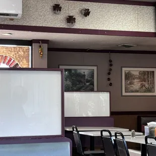 Dining Area/Almost fallen off decoration far right pot on ceiling