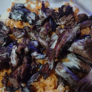 Arroz con carne is cost effective 13$ lunch special, smokey/tender and they do not over cook it.