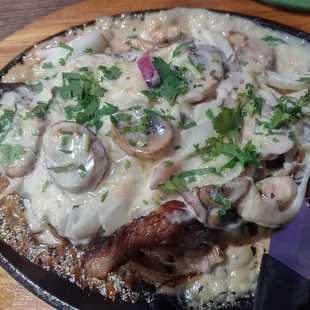 Their smothered steak is smaky and tender.