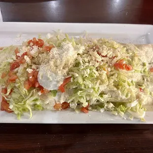 Burrito chicken n beef w/ queso and salad on top was recommend. 6/10. Veggies wilted, Rice inside was overcooked. Not the freshest quality