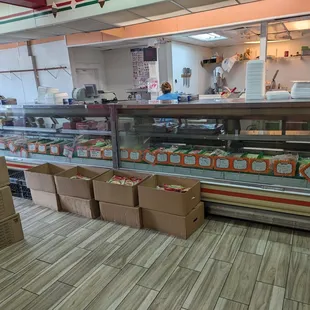 Tons of different cuts of meat at the meat counter