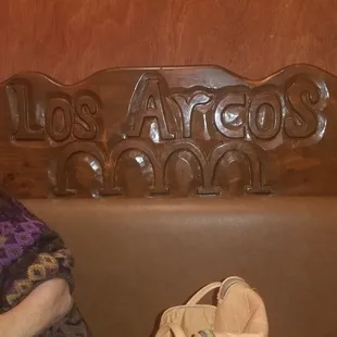 a woman sitting on a bench