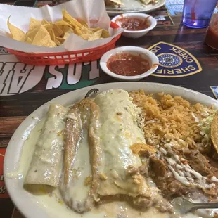 Chili Relleno, enchiladas, taco, rice and beans