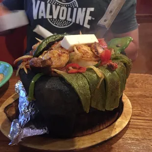 Molcajete! Phenomenal! Best the hubs has ever had in a Mexican restaurant! Chicken, beef, chorizo, shrimp, veggies, and salad.