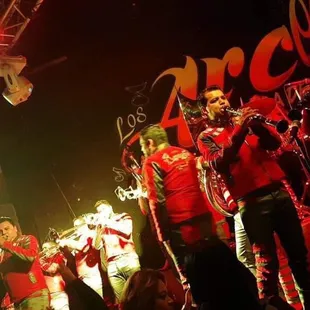 a band performing on stage