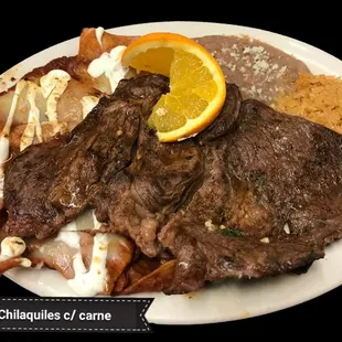 a plate of food with meat and rice