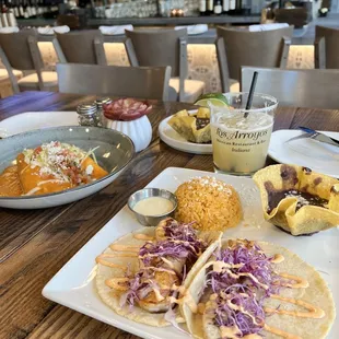 a plate of tacos and a plate of chips