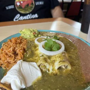Enchiladas Verdes with beans, rice and guacamole