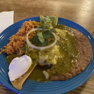 Green enchilada with perfect amounts of cheese, chicken, and tomatillo sauce.