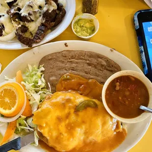 Beef Chile Relleno with refríes and charro beans.
