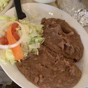 Double refried beans with a small salad.