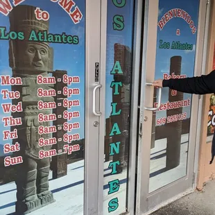 a man standing in front of a door