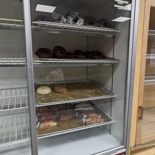 a display case of donuts