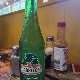 a bottle of jarritos grapefruit