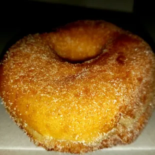 a donut covered in sugar