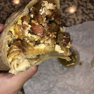 Bacon, Cheese, Potatoes, and Eggs Breakfast Burrito