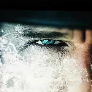 a close up of a man&apos;s eyes