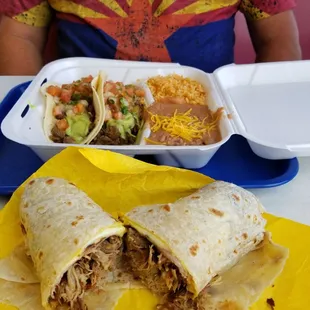 Yum. Carne asada tacos, refried beans and rice. Along with a Cuban pork burrito.