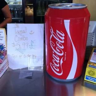 Special menu tamal combo option, next to an oversized Coca Cola display.