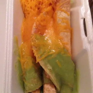 3 rolled tacos with guacamole and cheese