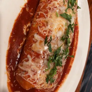 Chorizo burrito smothered in red