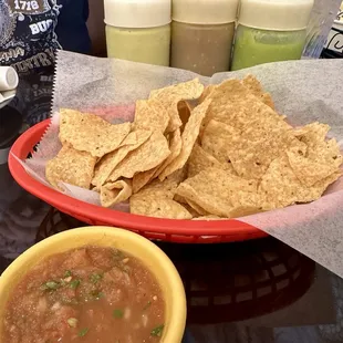 Chips and salsa, as well as the 3 sauces they provide to every table.