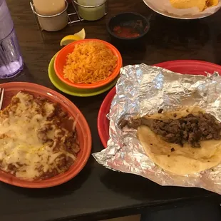 Tamale, tacos carne asada rice