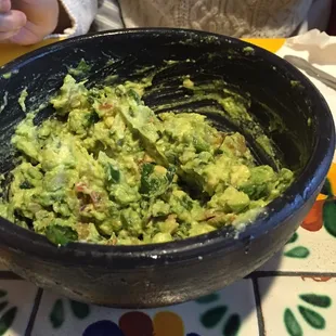 Table side guacamole, half portion.