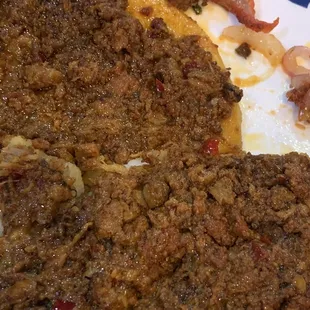 Asked for a mulita de chorizo and got whatever beef mix this was. The tacos de pastor are good though.