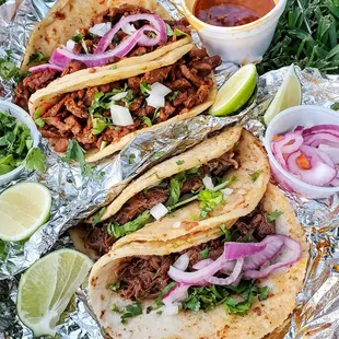 three tacoss on tin foil