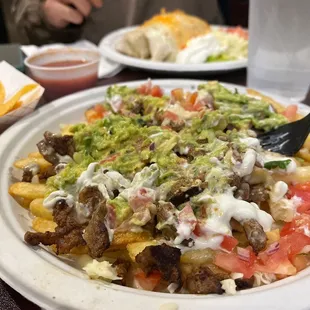 Carne asada fries and burrito buffalo
