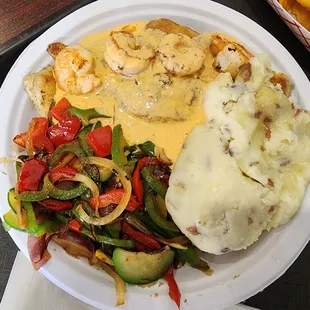 Pescado Gringo: 2 fish fillets, shrimp, onions, bell peppers, zucchini, squash; with smashed potatoes &amp; chipotle sauce