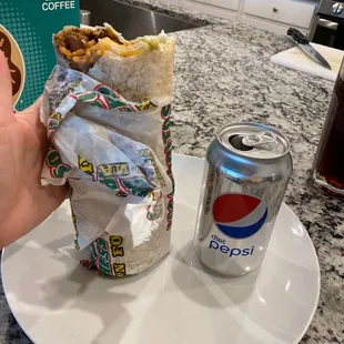 Super burrito with can for size comparison.