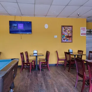 a pool table and television