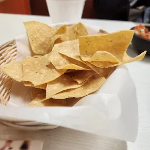 nacho chips in a basket