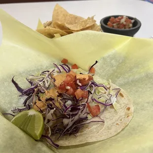 Shrimp taco and chips and salsa