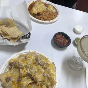 Cheese enchiladas, bean and cheese nachos, margarita