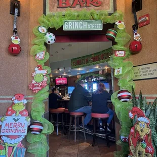 Grinch theming near the bar entrance.