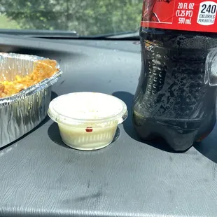 Cheese cup for pollo con queso. She said another one like this would cost 1.99. GREEDY.