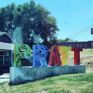 Pratt sign in front of restaurant
