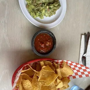 Nachos, salsa and guacamole.