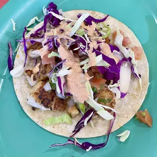 5" tortilla.  Fish taco= $6.99. Kind of pricey.