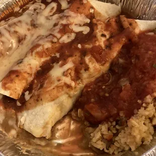 to go order:  three burritos, rice, &amp; beans