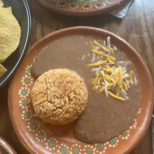 140. Mexican Rice 141. Refried Beans