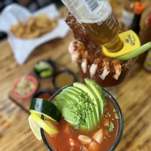 a bloody drink with avocado