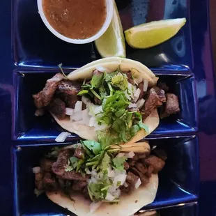 3 tacos asada. Pretty good size, and good salsa flavors. Yum  $13