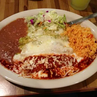 Campesinos special - Enchiladas trio (green, white, red) with side of beans, rice and salad